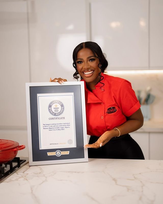 Hilda Baci during her historic cookathon that earned her a Guinness World Record and inspired a new generation of Nigerian record breakers