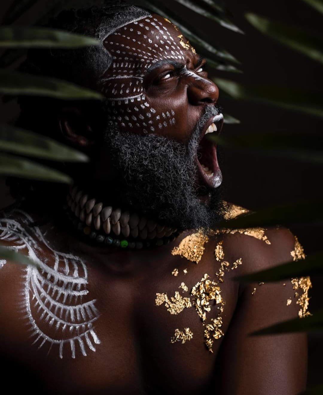 Daniel Lloyd in a jungle themed photoshoot, embodying strength, royalty and African cultural symbolism