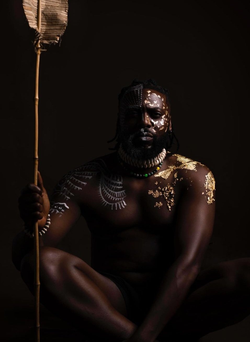 Daniel Lloyd showcasing a powerful jungle inspired fashion look in an artistic editorial photoshoot