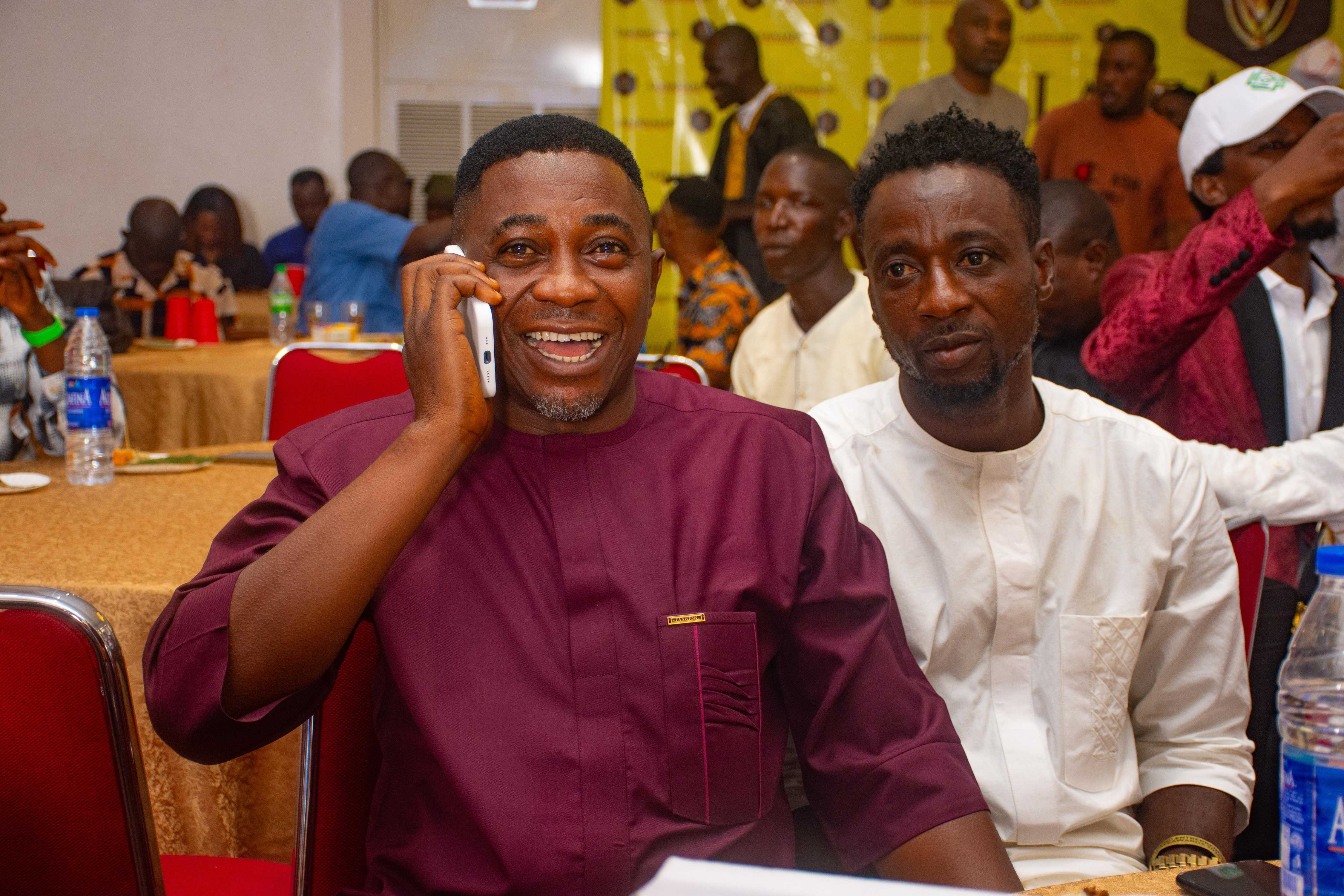 Smiling attendees during the awards in Lagos