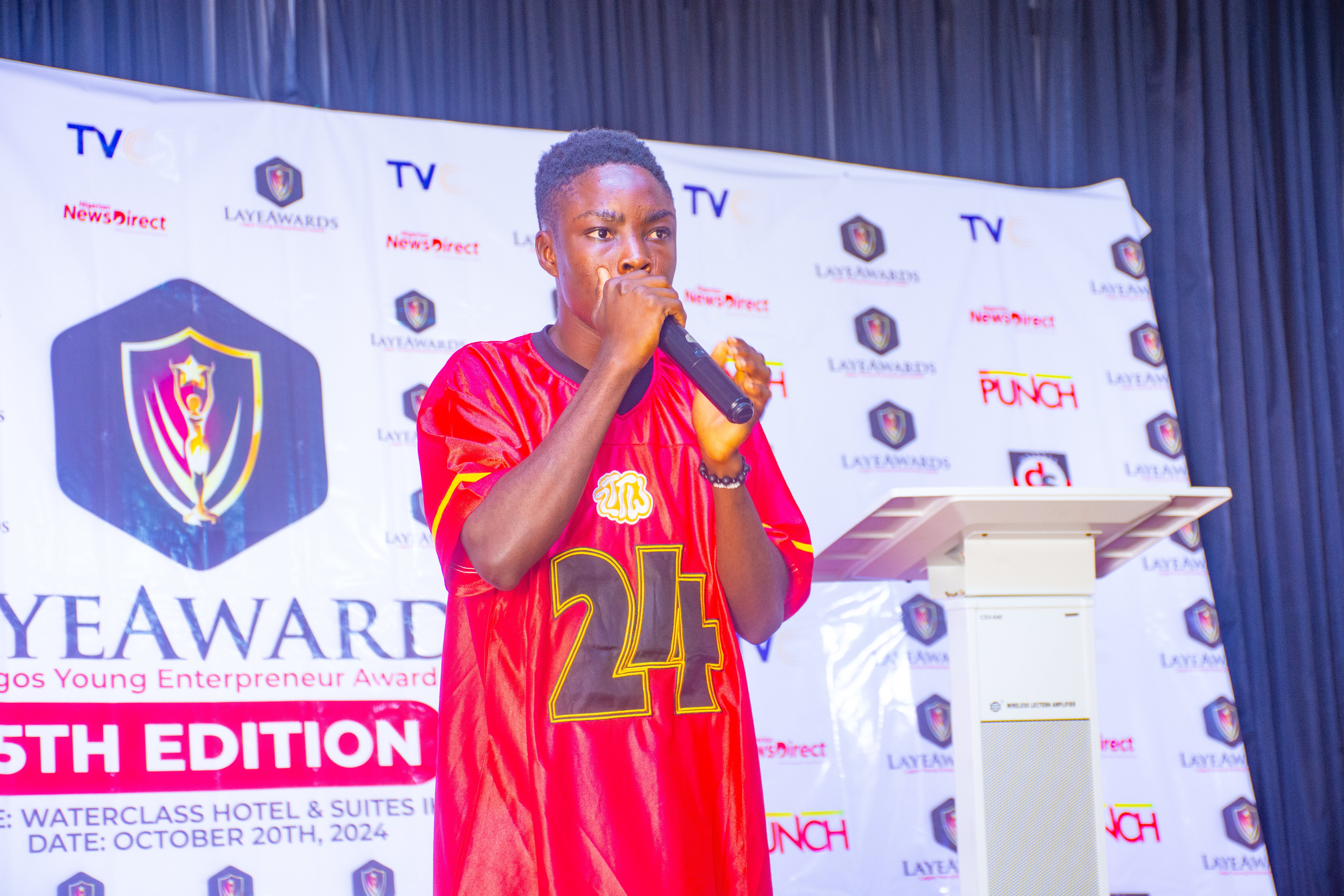 Another award moment on stage at Watercress Hotel, Ikeja