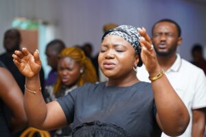 Nigerians in prayer showing faith in uncertain times