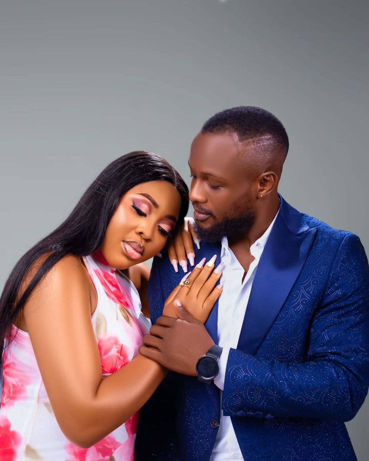 Couple sitting apart reflecting emotional distance in a relationship