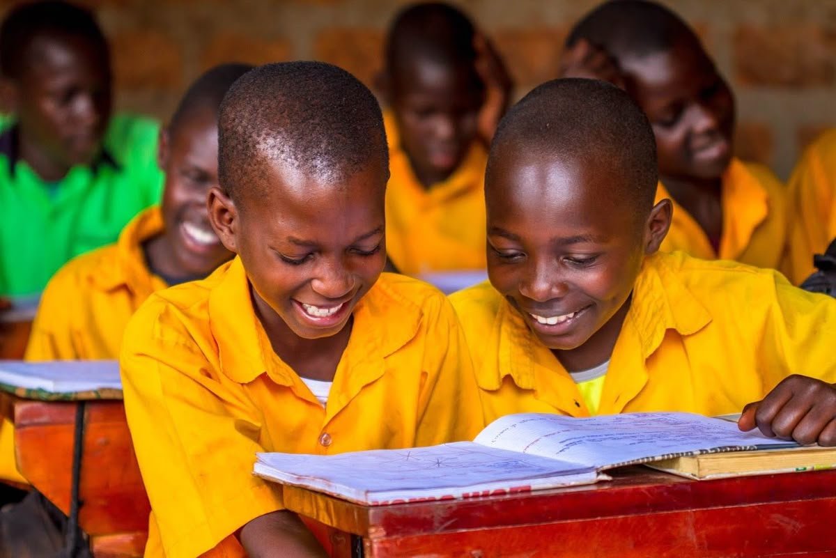 Nigerian students in a classroom learning and engaging with their studies