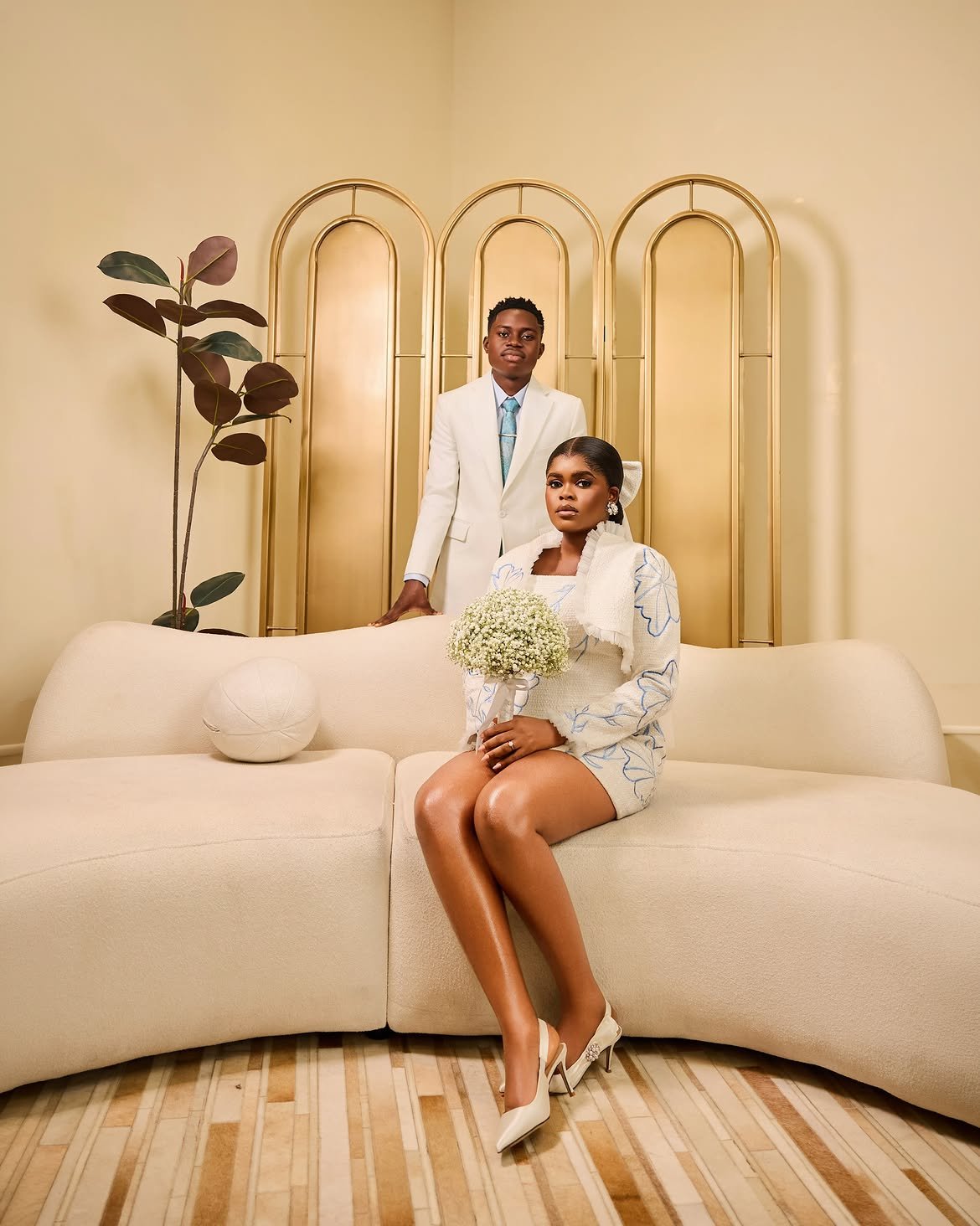 Peller and Jarvis pose together during their Lagos civil wedding ahead of their white wedding ceremony.